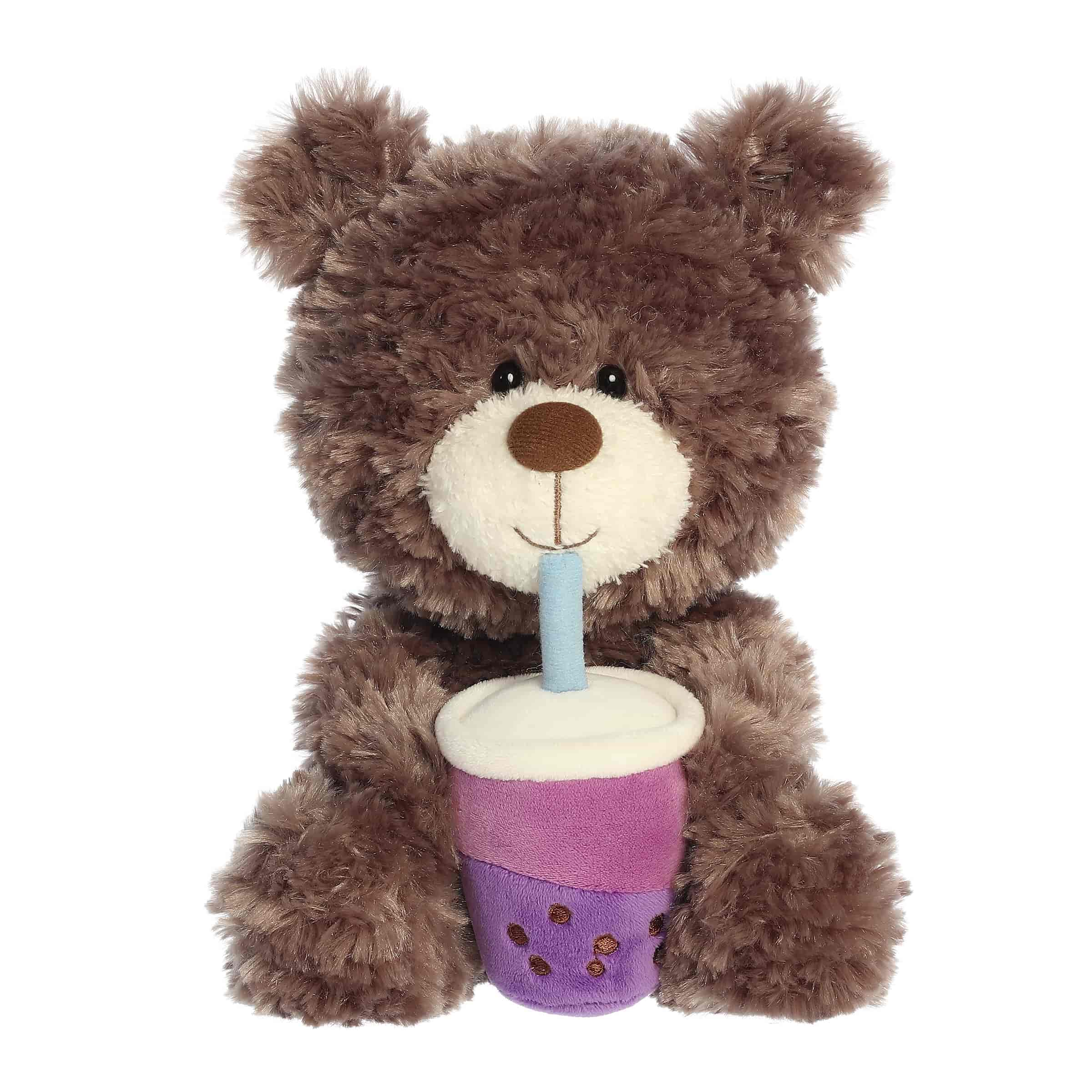 A plush brown bear holding a taro boba tea cup from Bear Stuffed Animals by Aurora.
