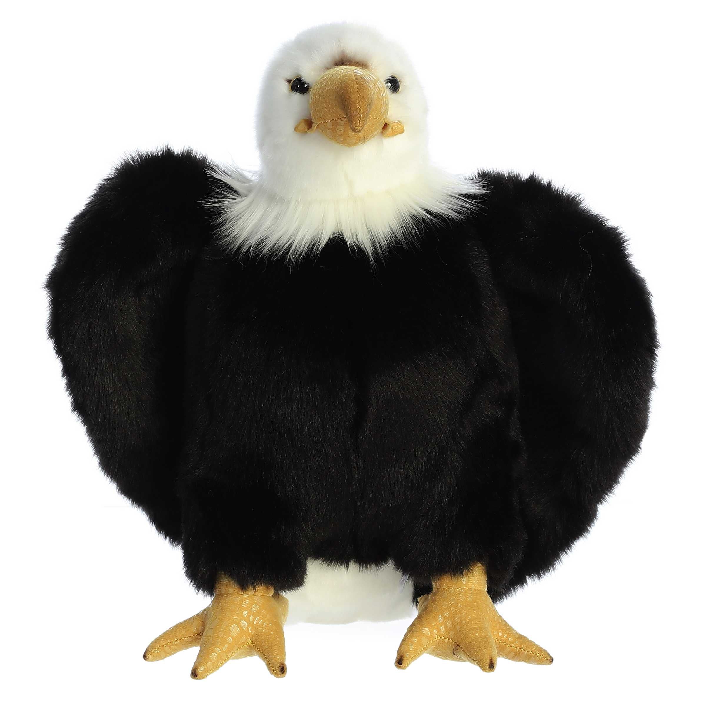A brown and white eagle plush toy from Aurora with a yellow beak and realistic feather accents.