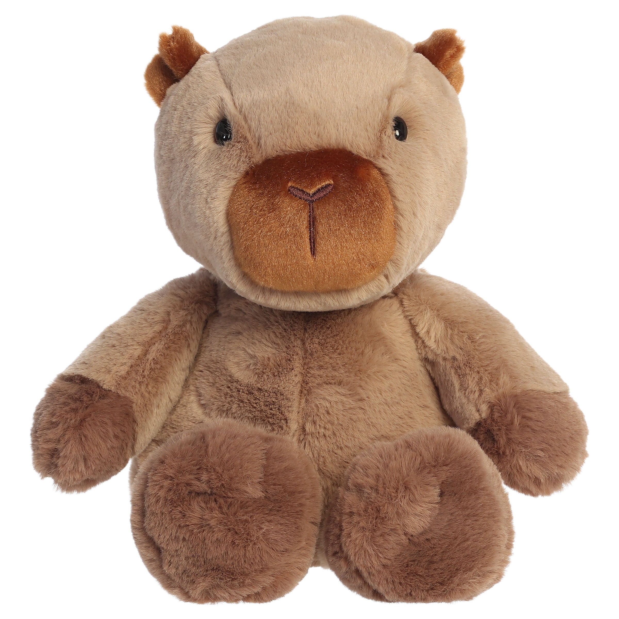 A capybara plush toy from Aurora with oversized stitched paws, neutral fur, and a softly weighted body.