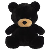 A black bear plush toy from Aurora with tiny limbs, black fur, and a plump bean-weighted body.