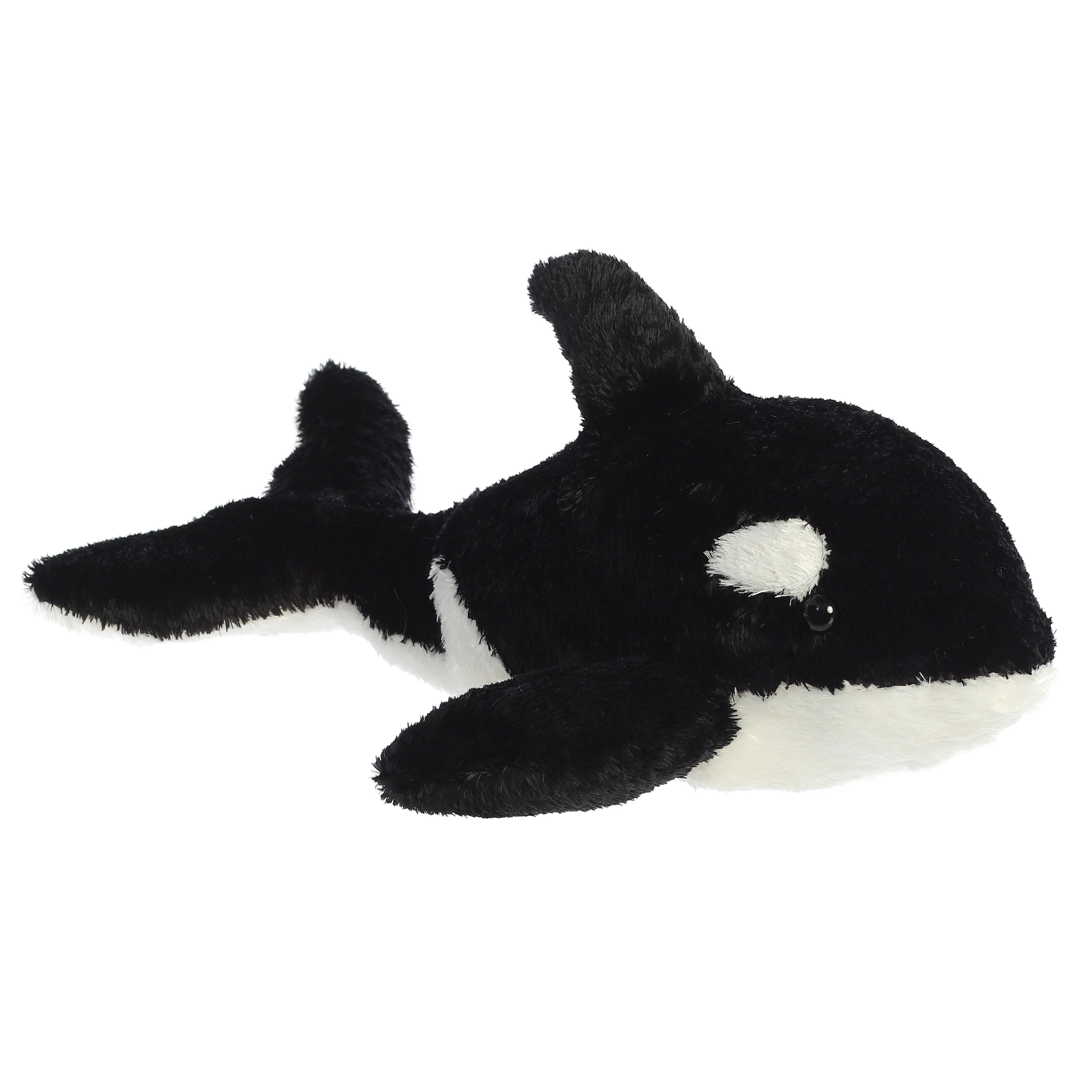 Plush toy of a black and white orca whale with soft textures and a cheerful face.