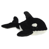 Plush toy of a black and white orca whale with soft textures and a cheerful face.