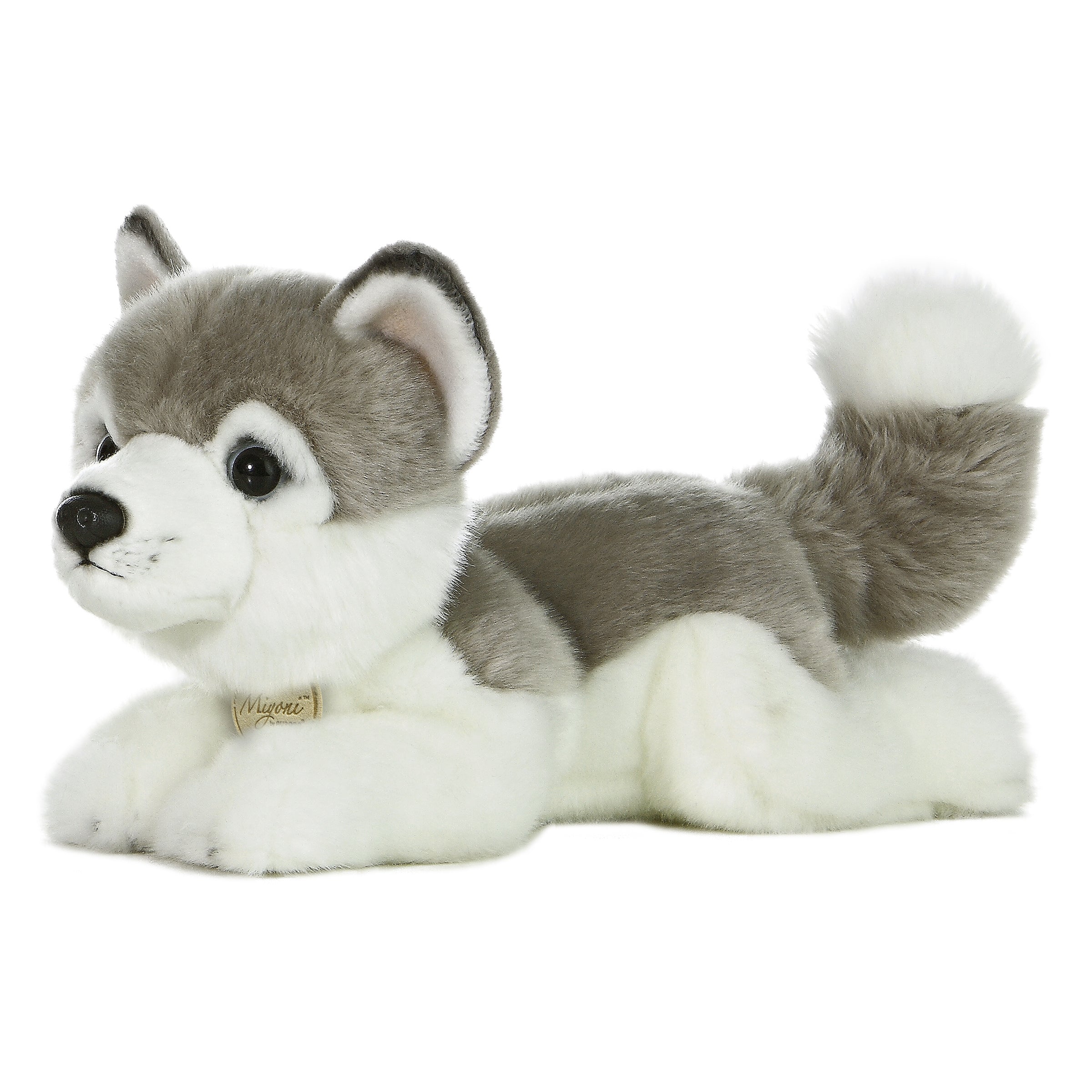 A grey and white Husky plush toy from Miyoni by Aurora with vivid blue eyes and a soft, cuddly build.
