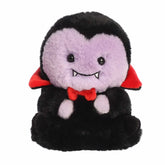 Delightful vampire plush with a compact size, cape, and bow tie, perfect for Halloween enthusiasts