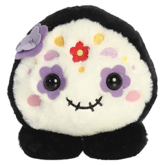 Black and white sugar skull plush with colorful festive details