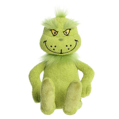 Festive green Grinch plush with his characteristic grin, ideal for fans and holiday gift-giving.