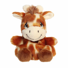 Raffie Giraffe plush with a patchwork of brown and white spots, large expressive blue eyes