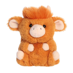 A soft orange-brown plush Highland cow with a fluffy tuft and round body from Rolly Pets by Aurora.
