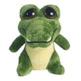 Green Gator plush from Dreamy Eyes by Aurora, with a soft green body and white belly