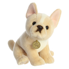 A French Bulldog puppy plush toy from Miyoni Tots by Aurora with cream-colored fur and large ears.