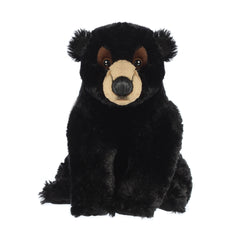 Plush black bear with velvety fur and soulful eyes for soothing bedtime companionship.