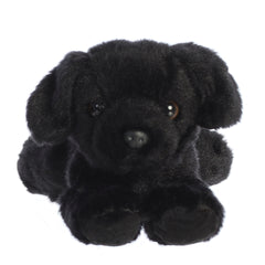 A black lab plush from Mini Flopsie by Aurora with velvety fur and a sweet, expressive face.