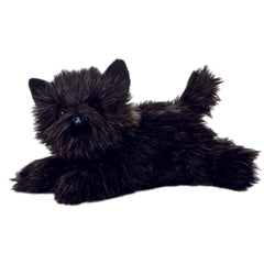 Plush toy of a shaggy black Cairn Terrier dog with big eyes and a lifelike expression.
