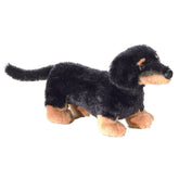 Plush black and tan Dachshund dog stuffed animal with long body and floppy ears by Aurora plush.