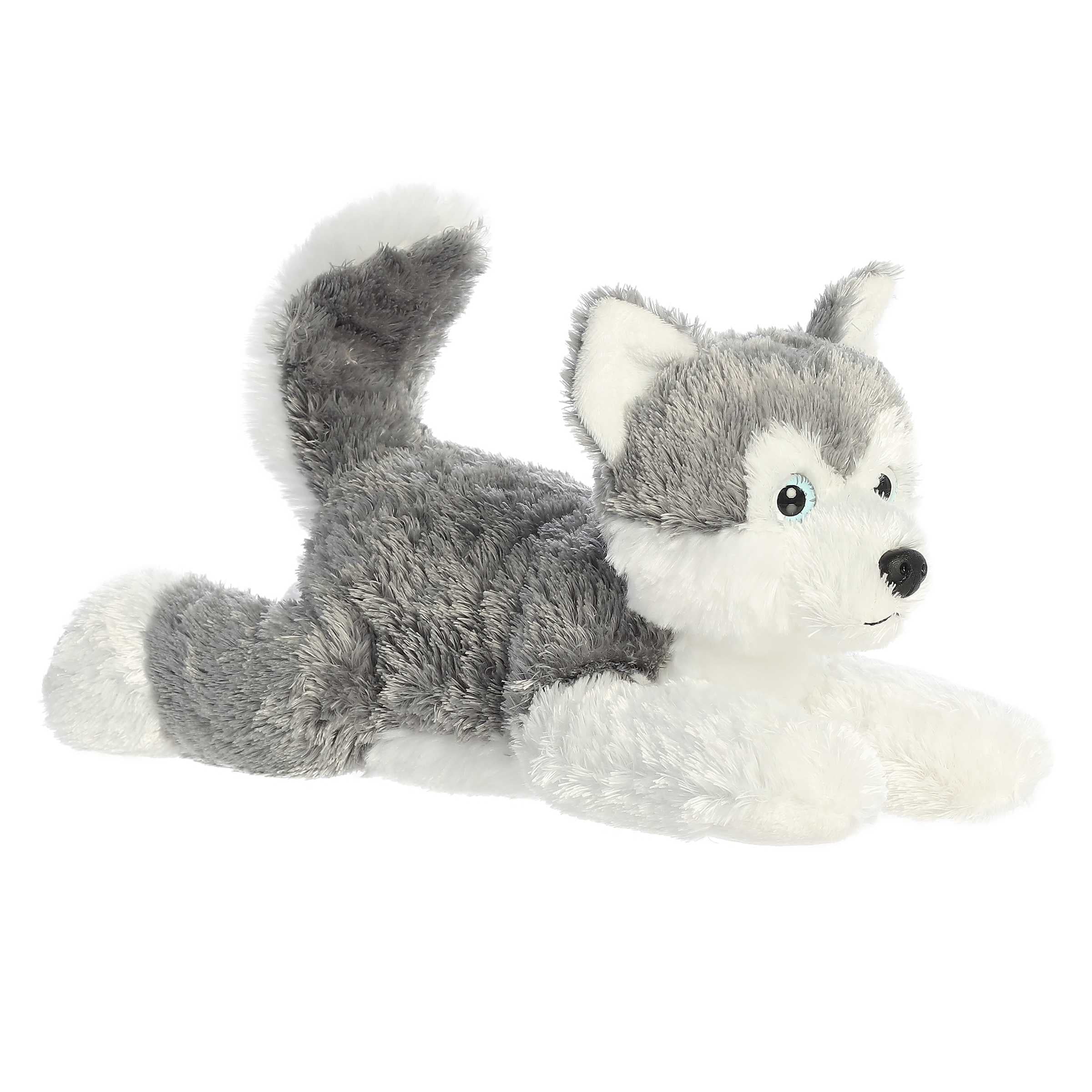 A grey and white husky plush with blue eyes and soft, fluffy fur by Aurora stuffed animals.