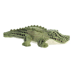A green alligator plush with detailed fur, black eyes, and a cuddly soft body by Aurora stuffed animals.
