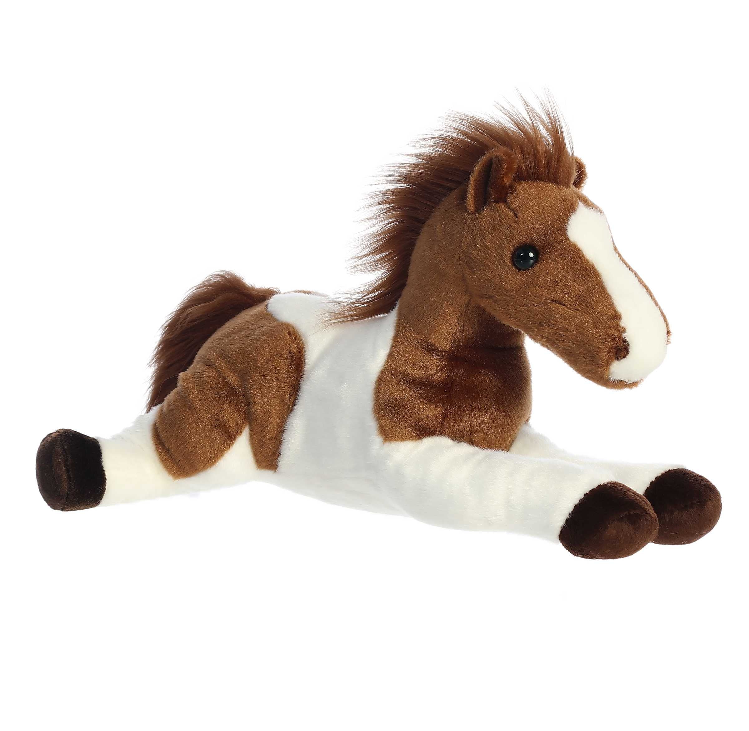 Plush toy of a brown and white horse with soft fur and fluffy mane, ready for snuggles.