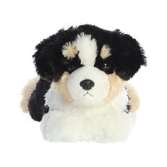 An Australian Shepherd plush dog with soft tri-color fur and bright, friendly eyes.