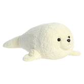 A large baby harp seal plush toy from Aurora with creamy white fur and expressive dark eyes.