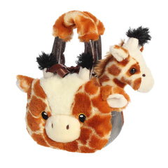 A giraffe-patterned carrier with an embroidered face and removable giraffe plush from Fancy Pals by Aurora.