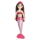 A pink-tailed mermaid plush toy from Sea Sparkles by Aurora with brown hair and a matching crown