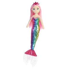 A rainbow-tailed mermaid plush toy from Sea Sparkles by Aurora with pink hair and a crown.