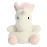 A unicorn plush from Aurora with white fur, a pink mane, pink hooves, and pastel accents.