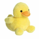 A Rubber Ducky plush from Palm Pals, featuring bright yellow fur and an inviting smile