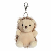 Hedgehog plush Clip-On from Palm Pals, featuring a soft beige body and cute softly spiked back