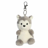 Husky plush Clip-On from Palm Pals, featuring a sleek gray and white body with fluffy patches and an endearing face