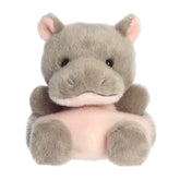 Plush toy of a grey hippo by Palm Pals with a bubblegum-pink belly, snout, and tiny rounded ears.