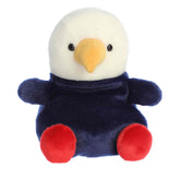 A large plush eagle with a white head, gold beak, and red and blue body from Party-Sized Palm Pals