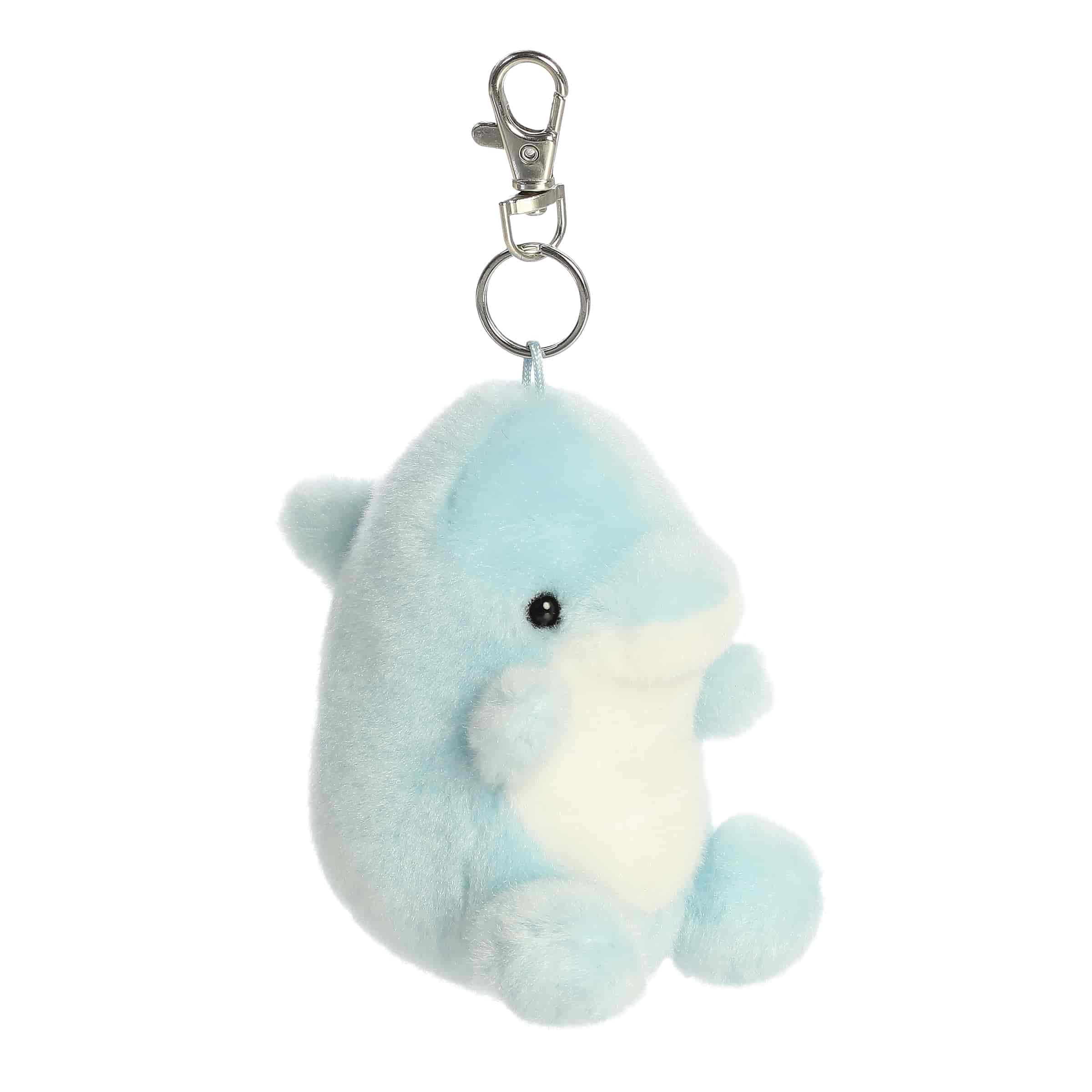 A small blue and white dolphin plush clip-on with a cheerful face from Palm Pals by Aurora.