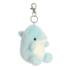 A small blue and white dolphin plush clip-on with a cheerful face from Palm Pals by Aurora.