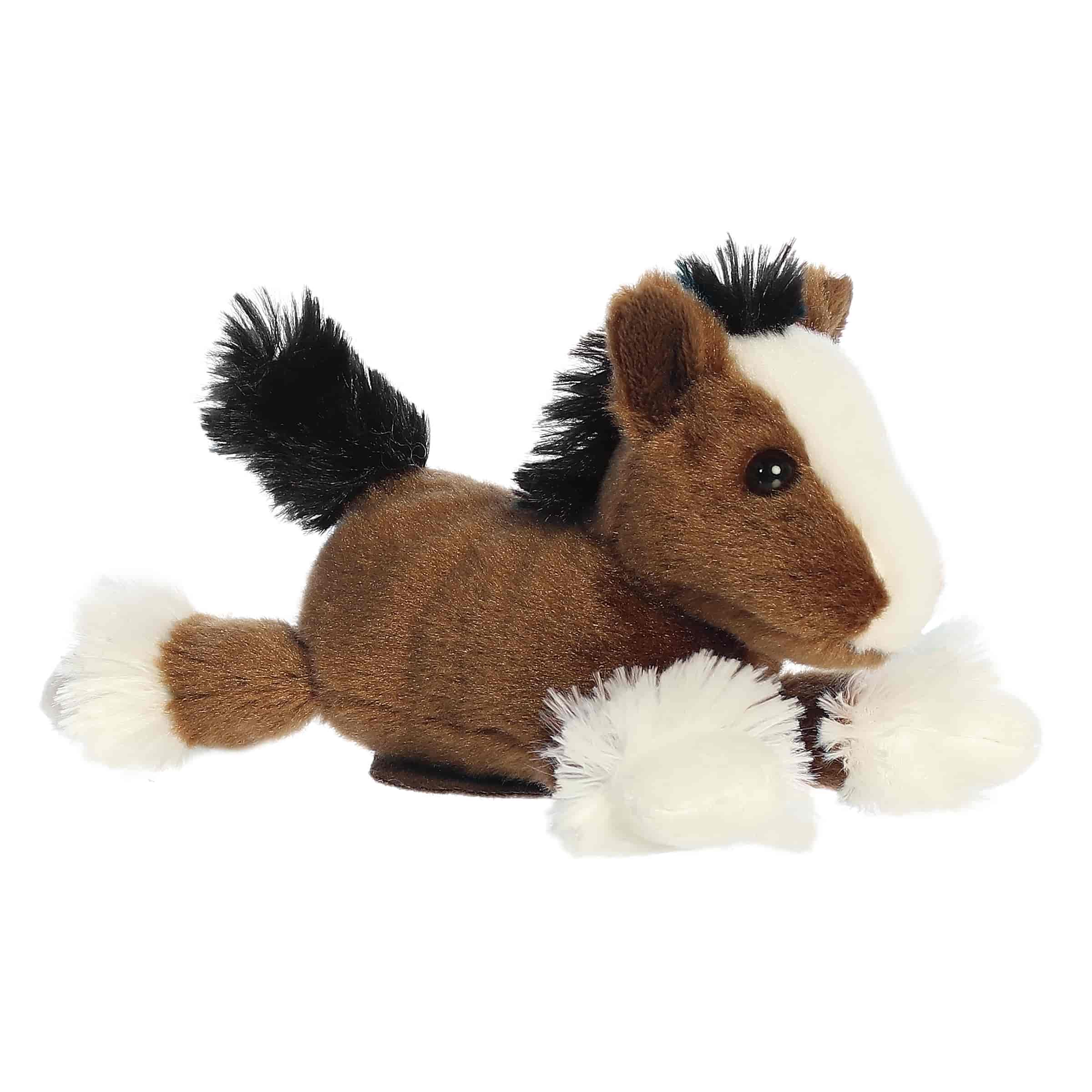 A brown Clydesdale plush with a white blaze, feathered hooves, and magnetic base from Shoulderkins by Aurora