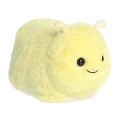 A round yellow banana slug plush with a sweet smile and soft texture from Spudsters by Aurora.