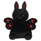 A party-sized mothman plush toy from Aurora with a dark body, red embroidered eyes, and crimson wing details.