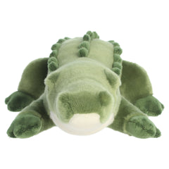 An alligator plush toy from Aurora with green fur, an elongated body, and textured accents.