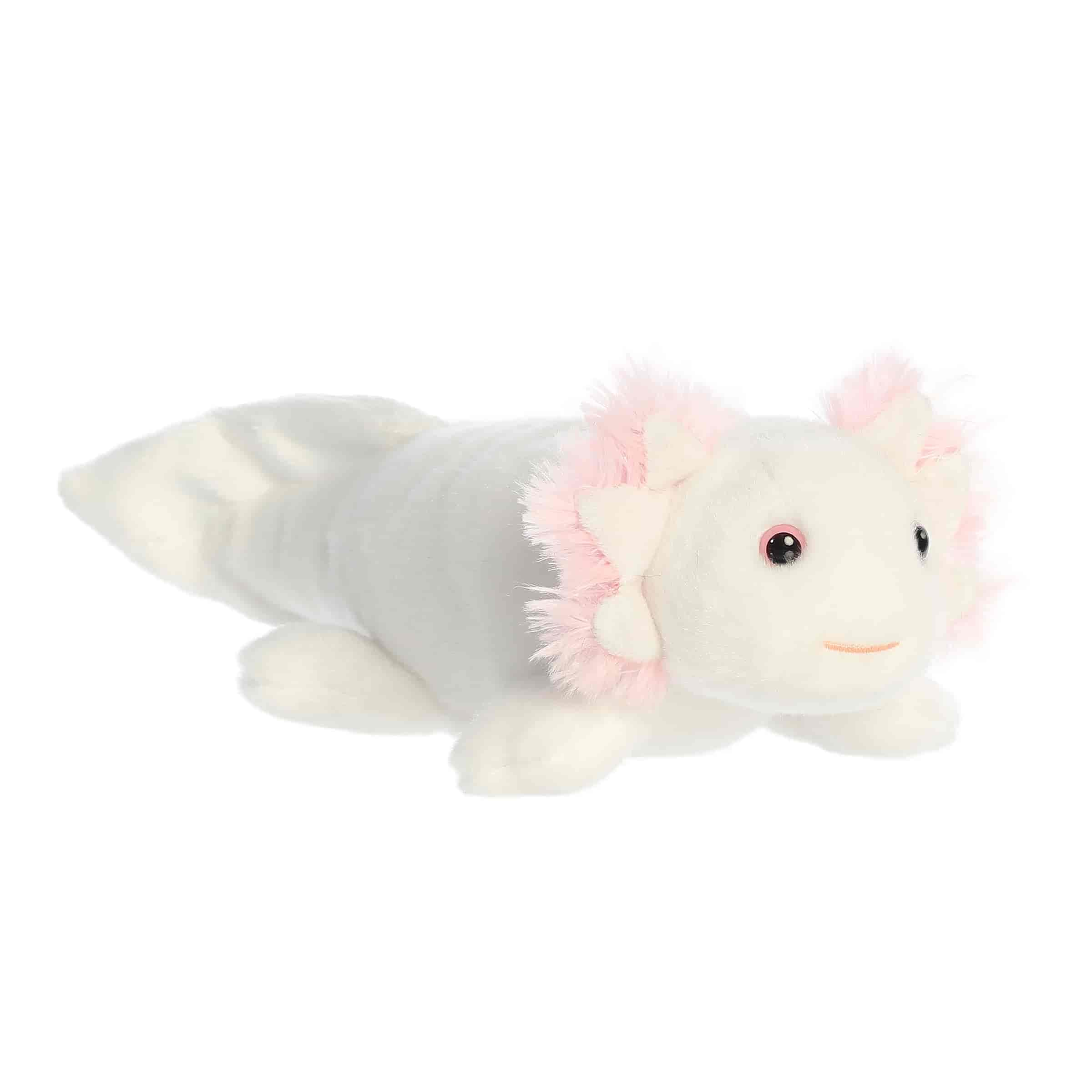 A white axolotl plush toy with soft pink frills and a stitched smile from Mini Flopsies by Aurora.