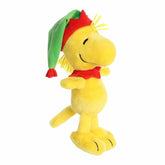 Woodstock plush dressed as a festive elf, featuring classic yellow feathers and holiday attire