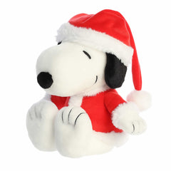 Snoopy plush in a red Santa outfit with classic charm and soft design, perfect for Peanuts fans
