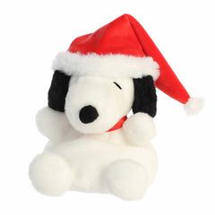 Snoopy plush with floppy ears and red Santa hat, soft and festive—perfect for Peanuts fans