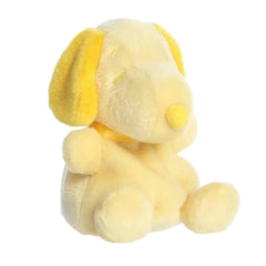 A yellow Snoopy plush beagle with soft rounded shape from Palm Pals Snoopy Color Collection