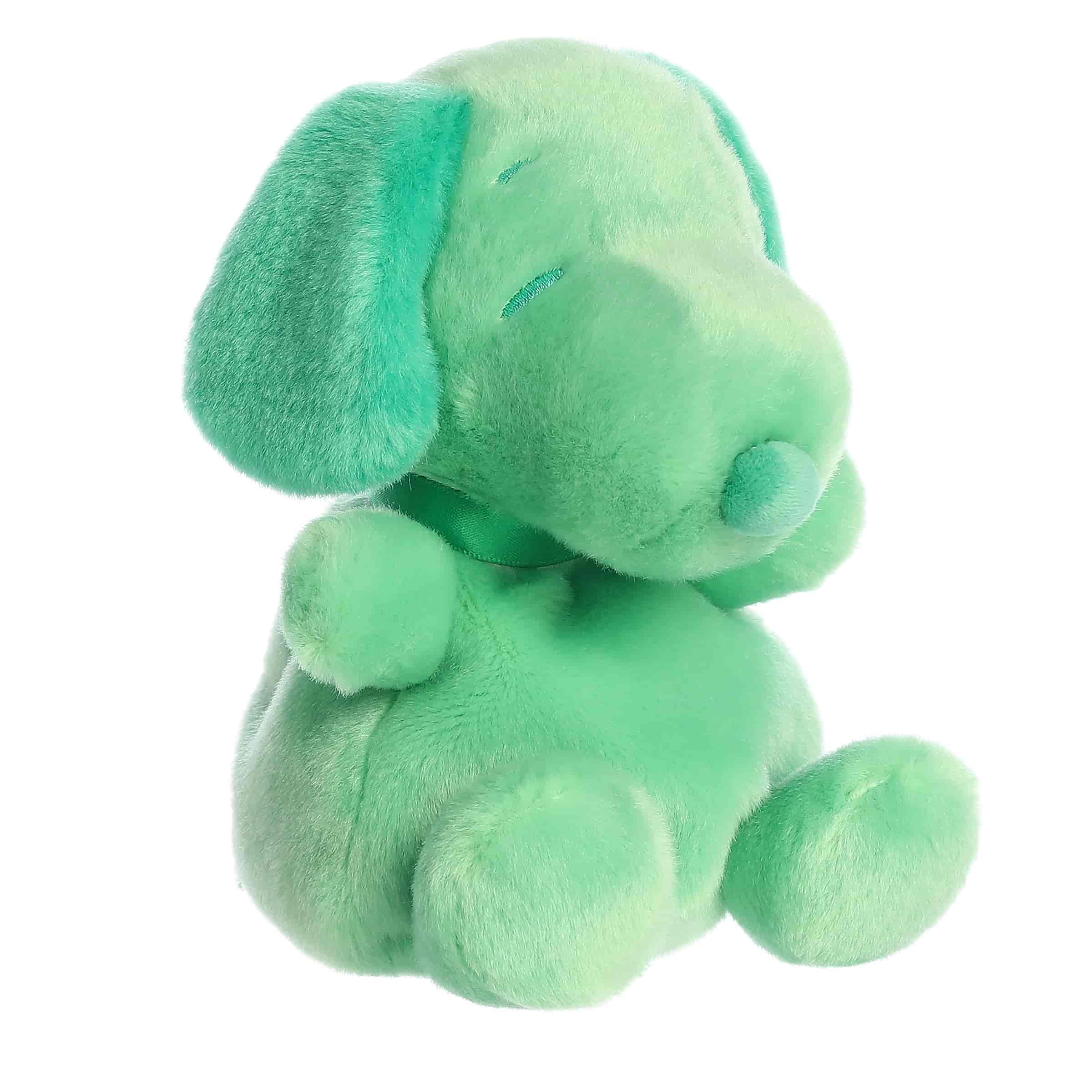 A green Snoopy plush beagle with soft fabric and round shape from Palm Pals Snoopy Color Collection.