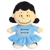 A Lucy plush toy from Aurora with her signature look and beans in her feet.