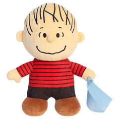 A Linus plush toy from Aurora with his signature outfit, blue blanket, and beans in his feet.