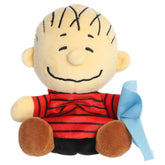 A Linus Palm Pal plush toy from Aurora with a striped shirt, embroidered smile, and blue blanket.