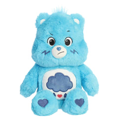 Grumpy Bear plush with soft blue fur, grumpy expression, round ears, and rain cloud belly badge