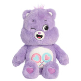 Share Bear plush with soft purple fur, winking smile, round ears, and heart lollipop belly badge