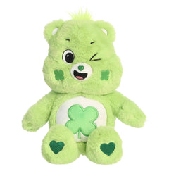 Good Luck Bear plush with soft green fur, happy face, round ears, and green shamrock belly badge